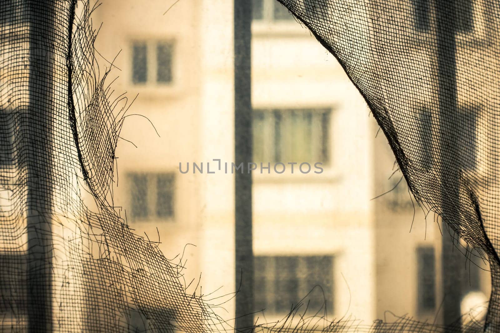 Broken Window Screens of a Chinese Apartment