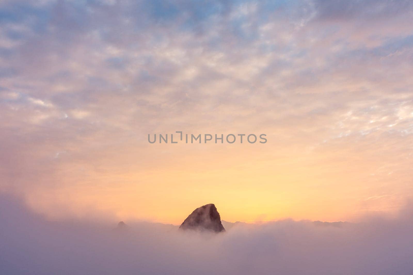 Mountain Peaks in Cloudy Sunrise Foggy Landscape Yangshuo