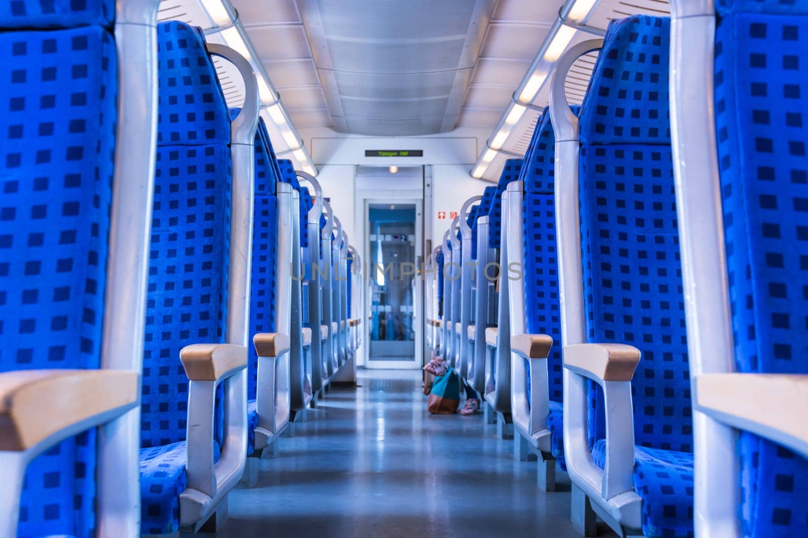 Modern Train Wagon Interior Seats Rows Blue Transportation White Daytime Traveling Empty