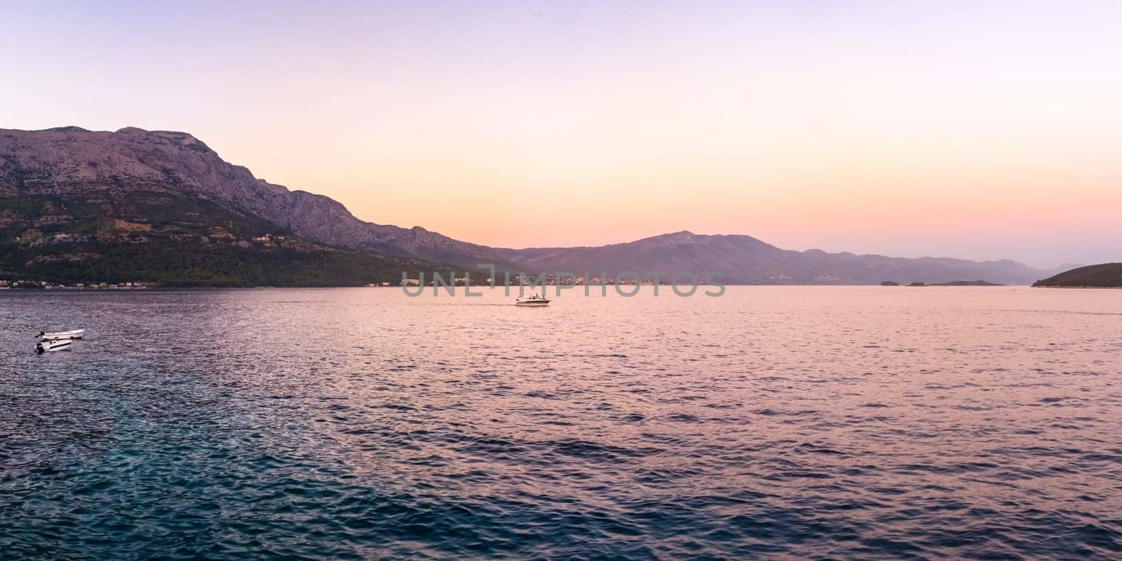 Beautiful Sunset Dusk Ocean Mountain Landscape in Croatia European Vacation Destination