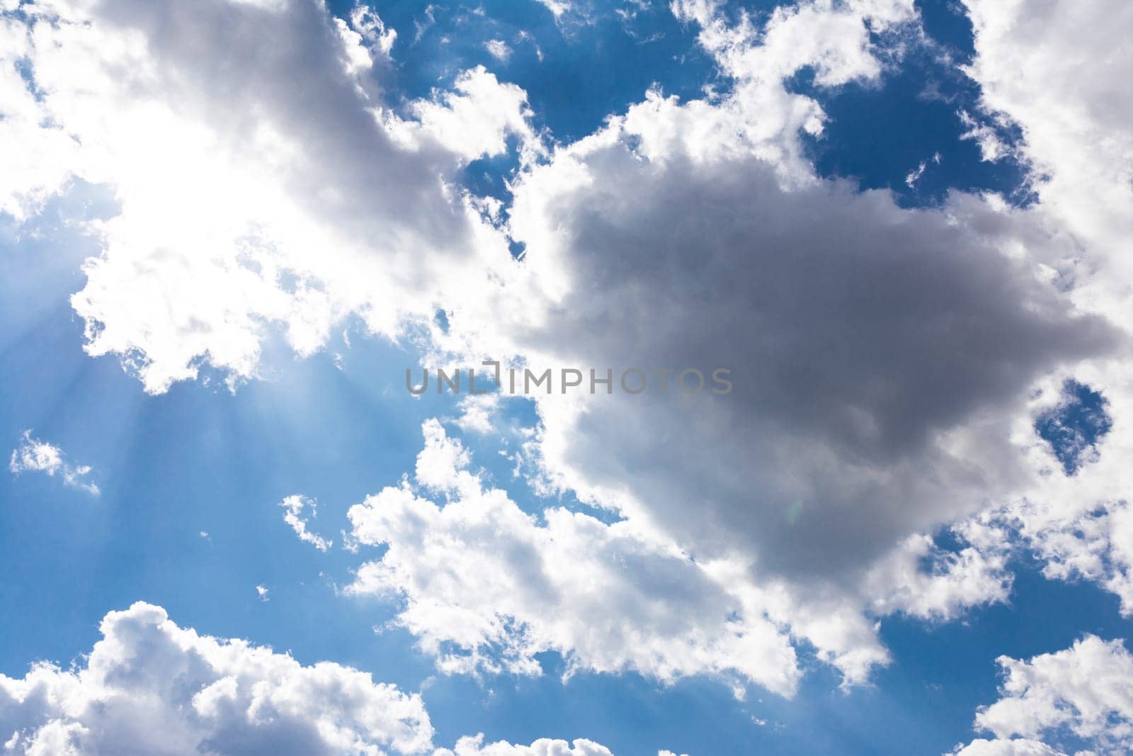 White Clouds Blue Sky Fluffy Sun Flare Airplane Trail  Sunny Daytime Texture Background