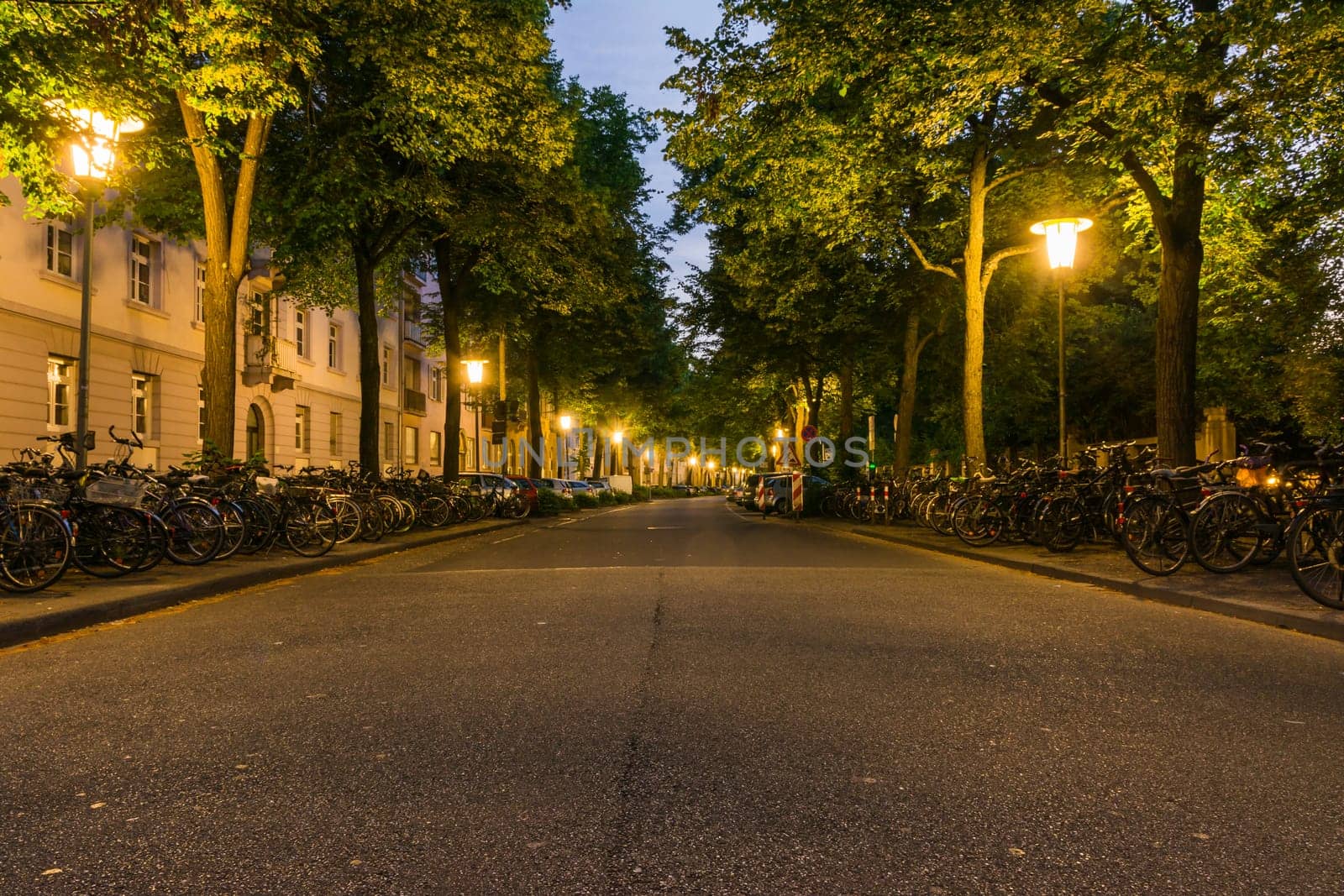 Sunrise over Street Across from Karlsruhe Train Station Lamps Dawn Sleepy Quiet Road