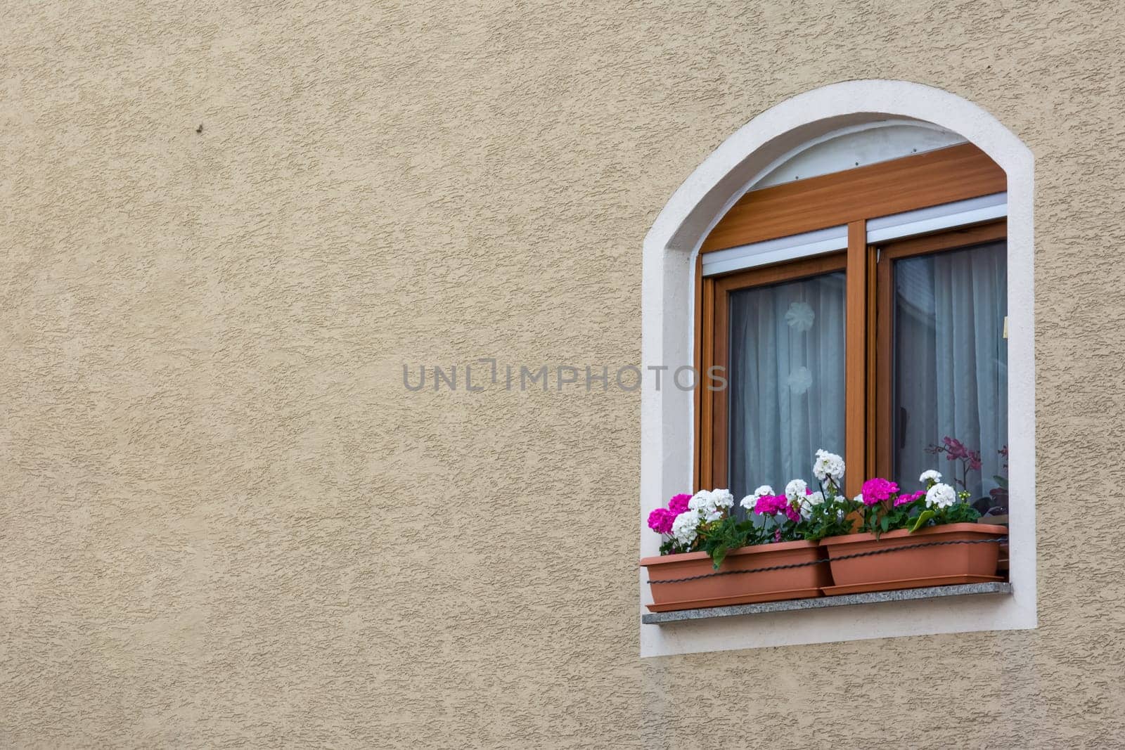 Cute European WIndow on Stucco Wall Texture Background with Copyspace
