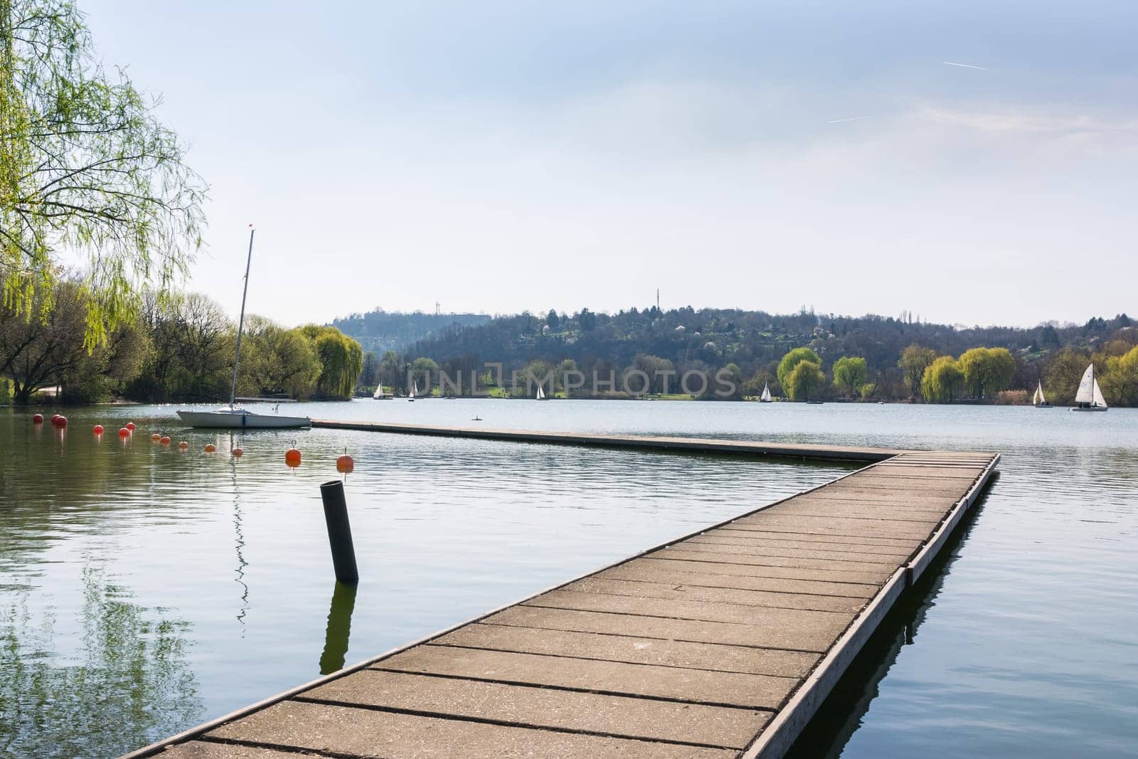 Concrete Dock Perspective Out onto Lake Outdoors Autumn Daytime Landscape