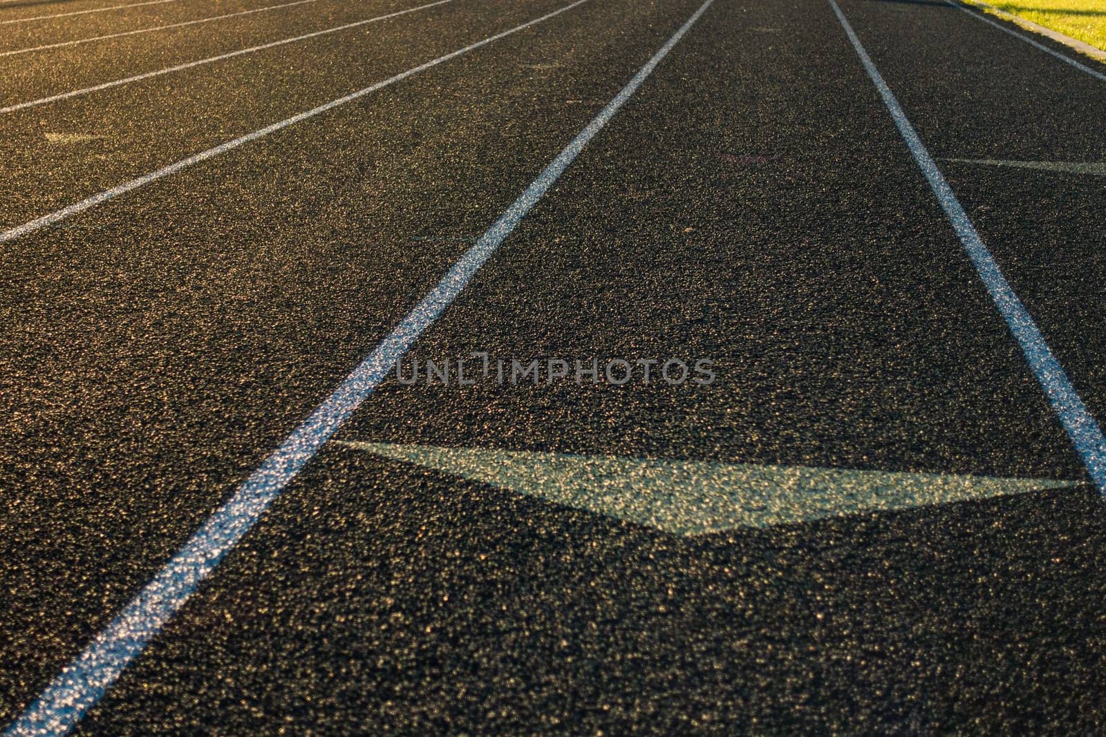Running Track Sun Flare Arrow Lanes Black Turf Grassy Sports Field
