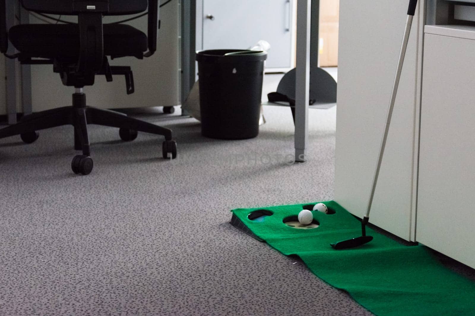 Putting Green in Modern White Office Corporate Fun Entertainment Sport Putter Balls Hole