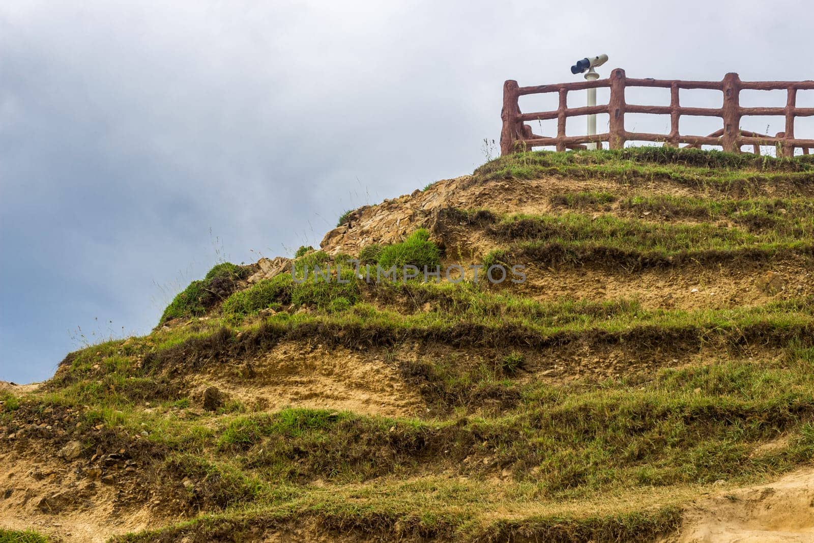 Grassy Cliff with Binoculars Beachy Feel