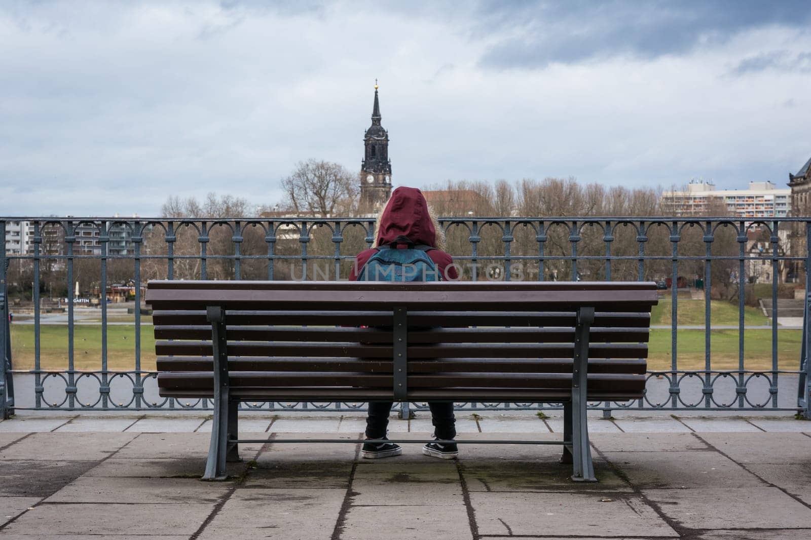 Girl Sitting Alone on Bench Cold Winter City Landscape Dresden Wooden Young