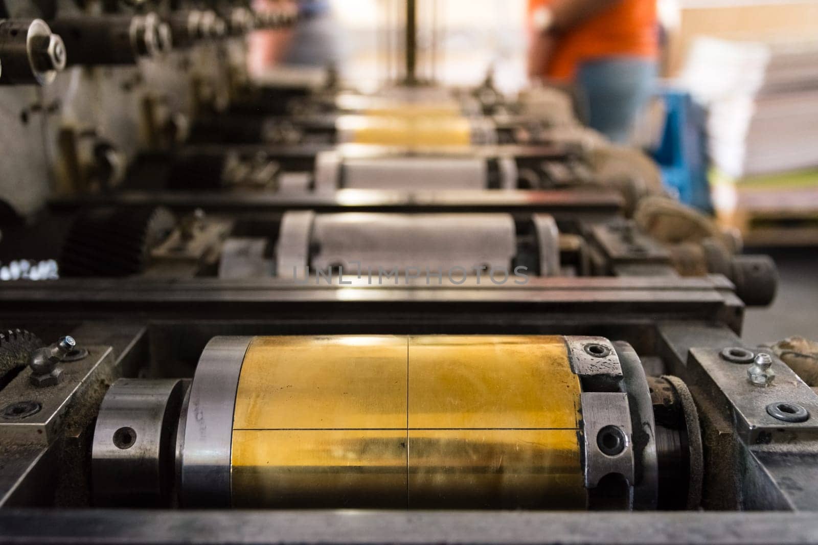 Golden Letterpress Cylinders Rustic Vintage Printing Method Metallic Rollers Four Color CMYK Print Closeup Machine Industrial Equipment