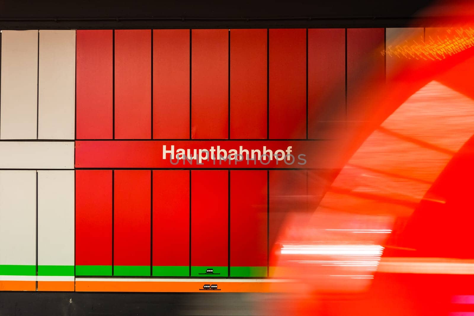 Hauptbahnhof German Train Station Sign Red Motion Blur Wagon Passing Moving Symbol Text