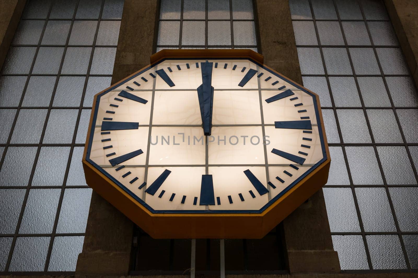 Large Stone Wall Clock Windows Glass Train Station Hands Midday 12 o Clock Glowing Face Hands