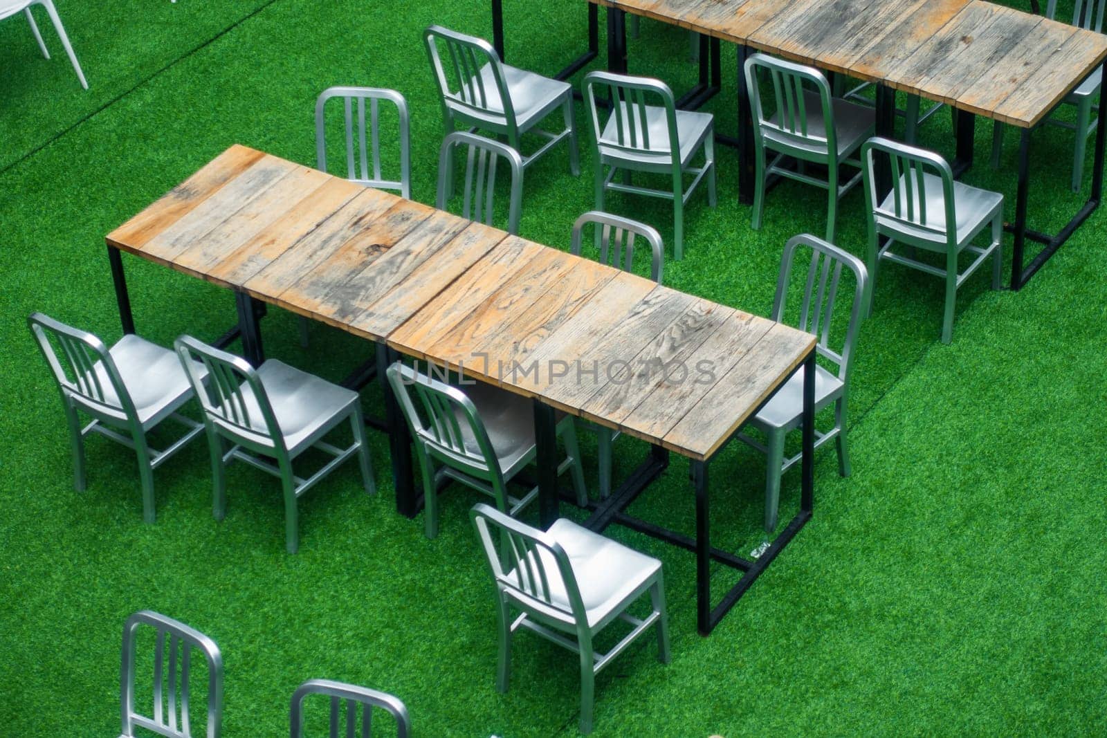 Desks and Chairs are arranged in order on the Lawn