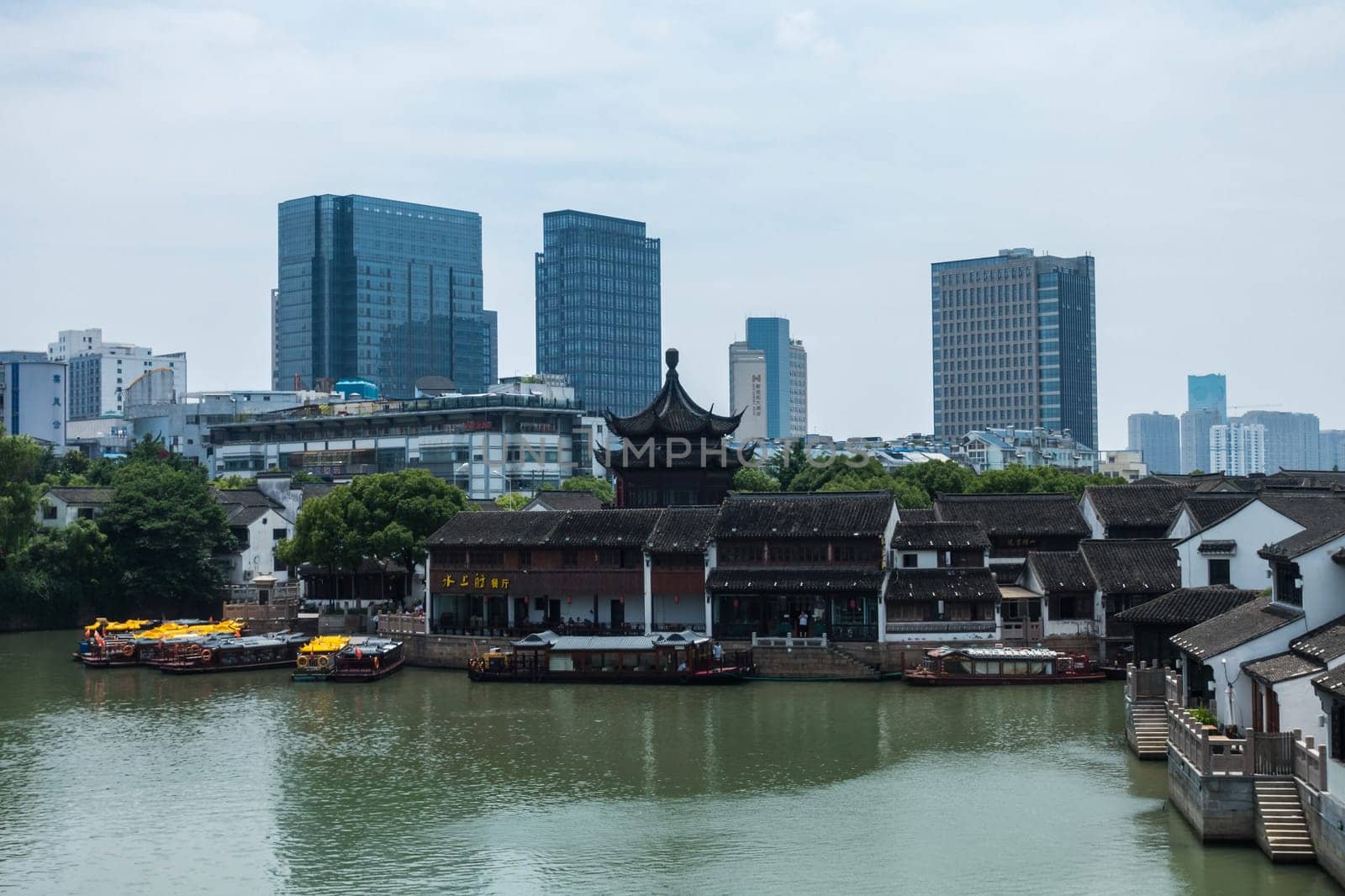 Traditional Architecture and Modern Architecture in Shan Tang Jie in Suzhou, China on June 2nd, 2018