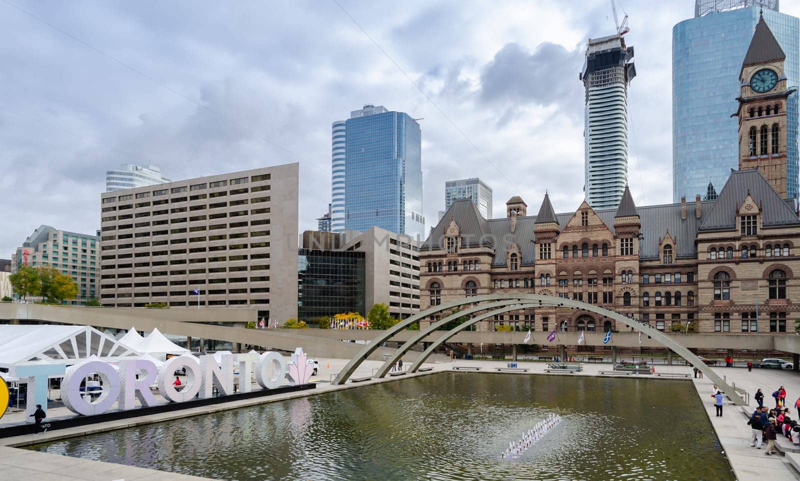 Toronto, Canada -October 13, 2018: Nathan Phillips Square with Toronto Old City Hall background in cloudy day.