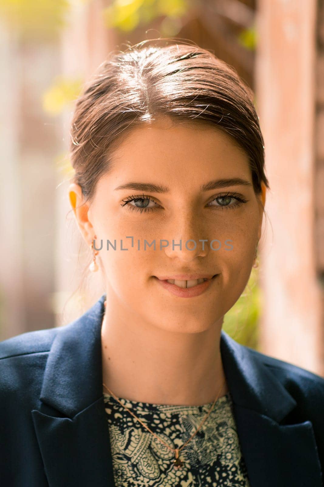 Portrait of beautiful young woman at outdoors