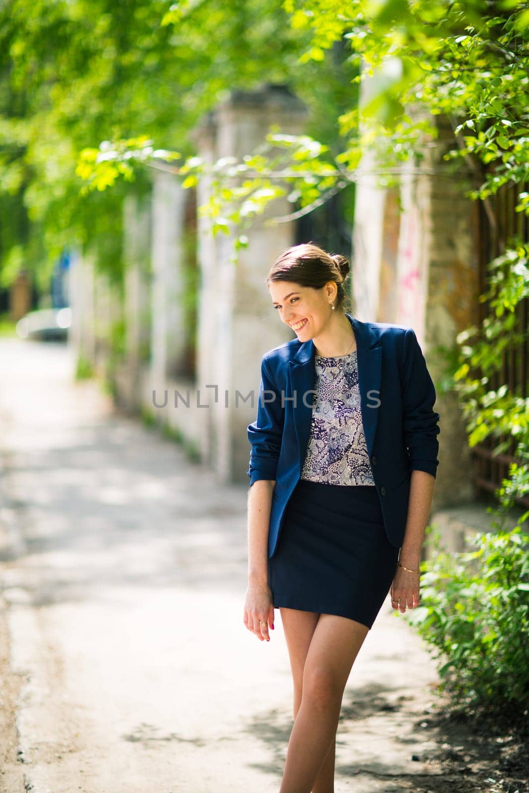 Portrait of beautiful young woman at outdoors