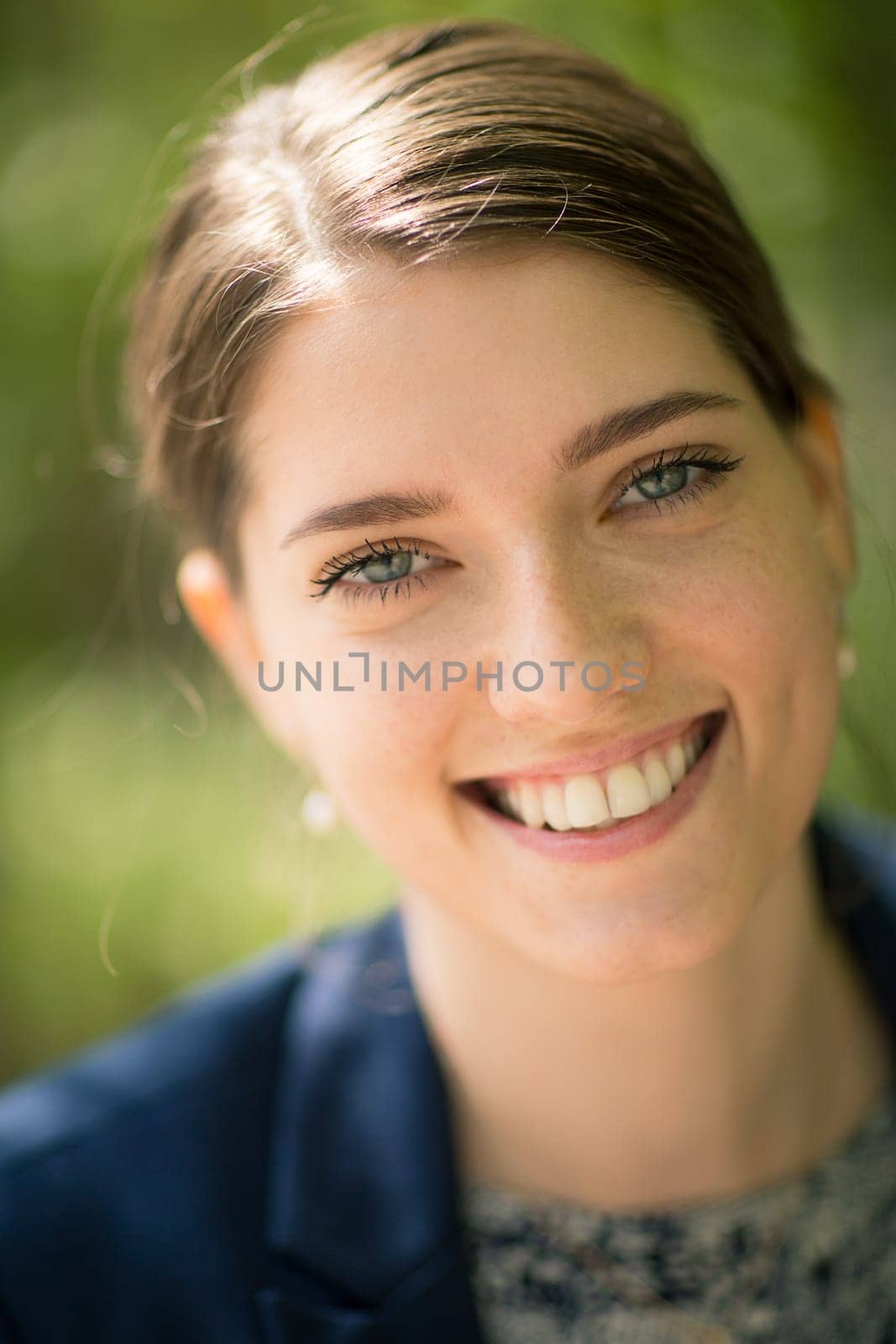 Portrait of beautiful young woman at outdoors