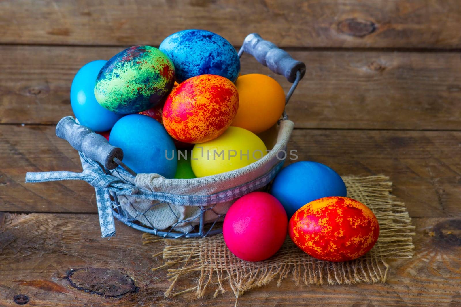 Happy Easter, colorful eggs in a basket