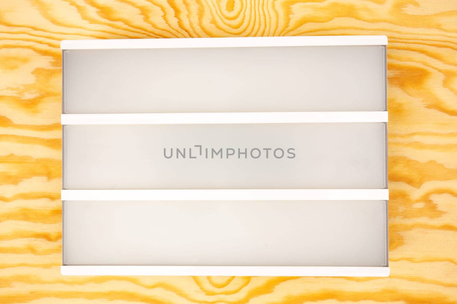Blank Letter Light Box on wooden Background
