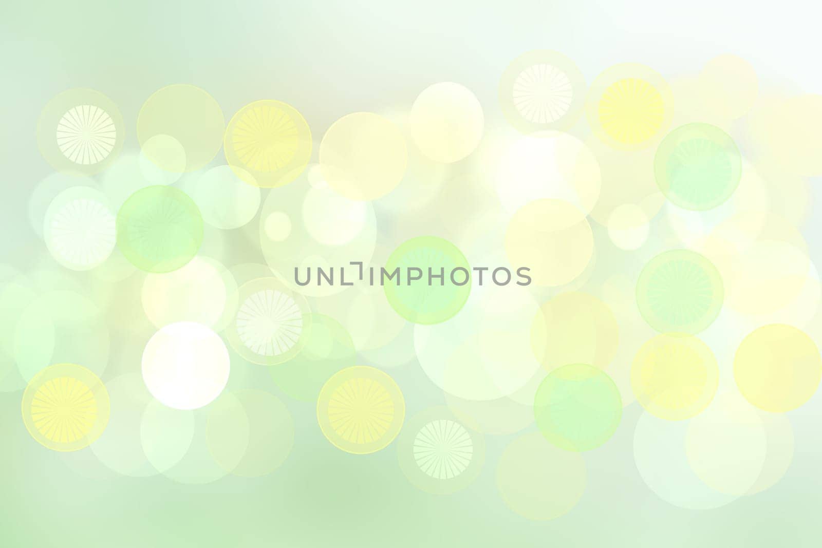 Abstract blurred light green pastel background texture with white and yellow bokeh circles.