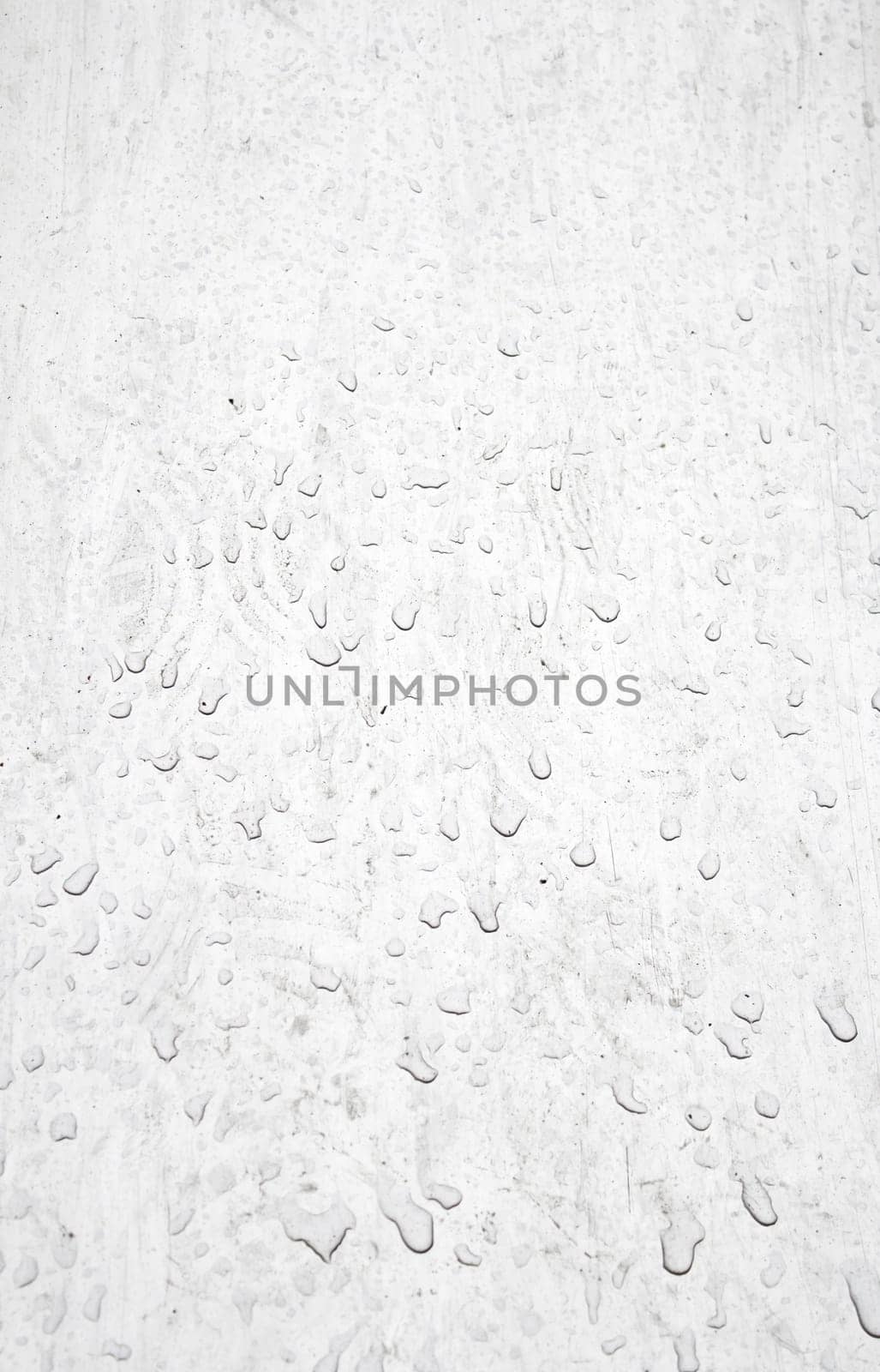 Metal with water drops on silver surface, construction and architecture