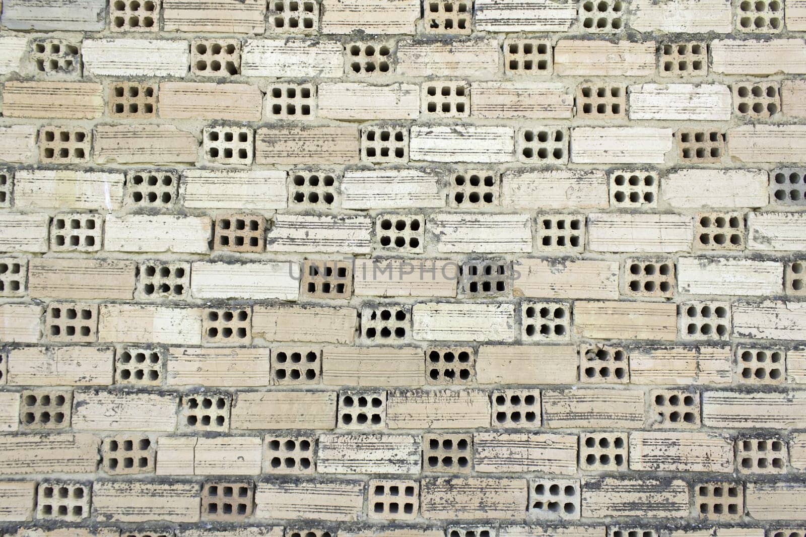Aged brick structure outside urban building, construction