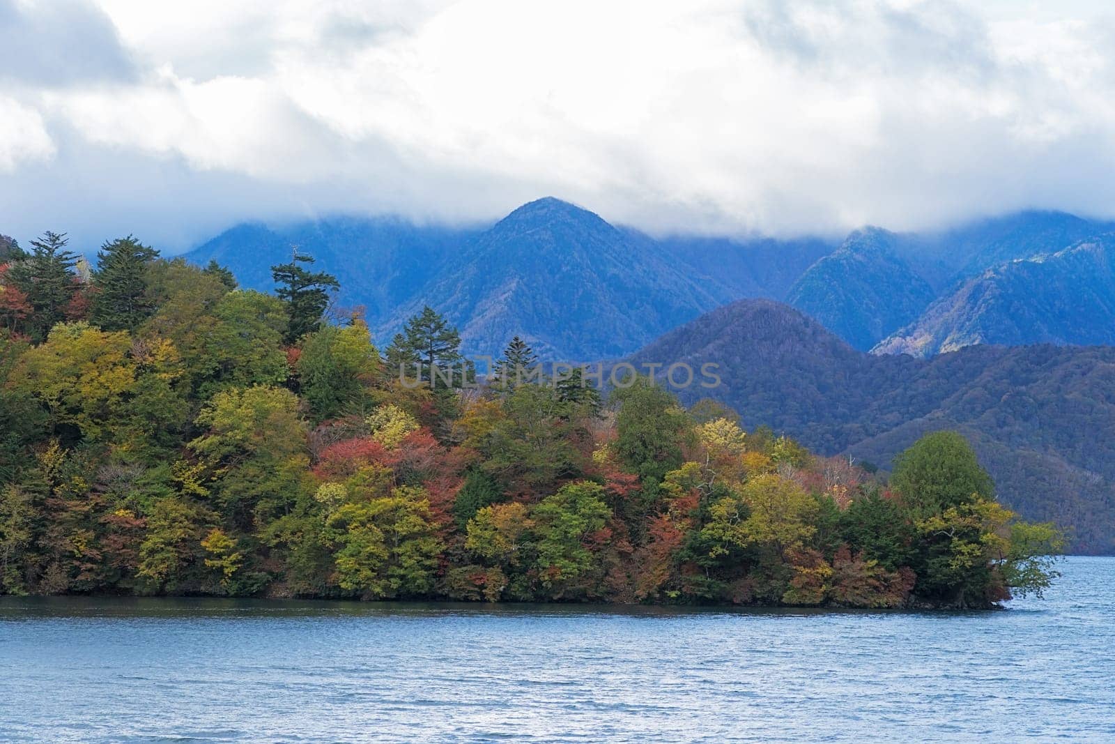 Lake Chuzenji is a scenic lake in the mountains above the town of Nikko. It is located at the foot of Mount Nantai, Nikko's sacred volcano, whose eruption blocked the valley below, thereby creating Lake Chuzenji about 20,000 years ago. This photo was shot in autumn