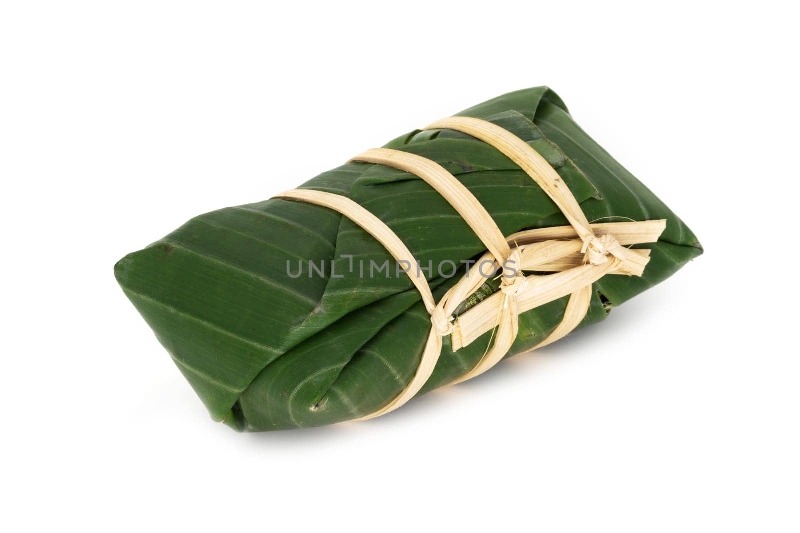 Sticky Rice In Banana Leaf, traditional thai food on white background