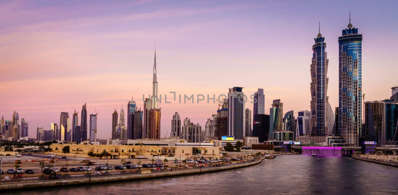 Scenic view of skyline of Dubai's downtown at sunset