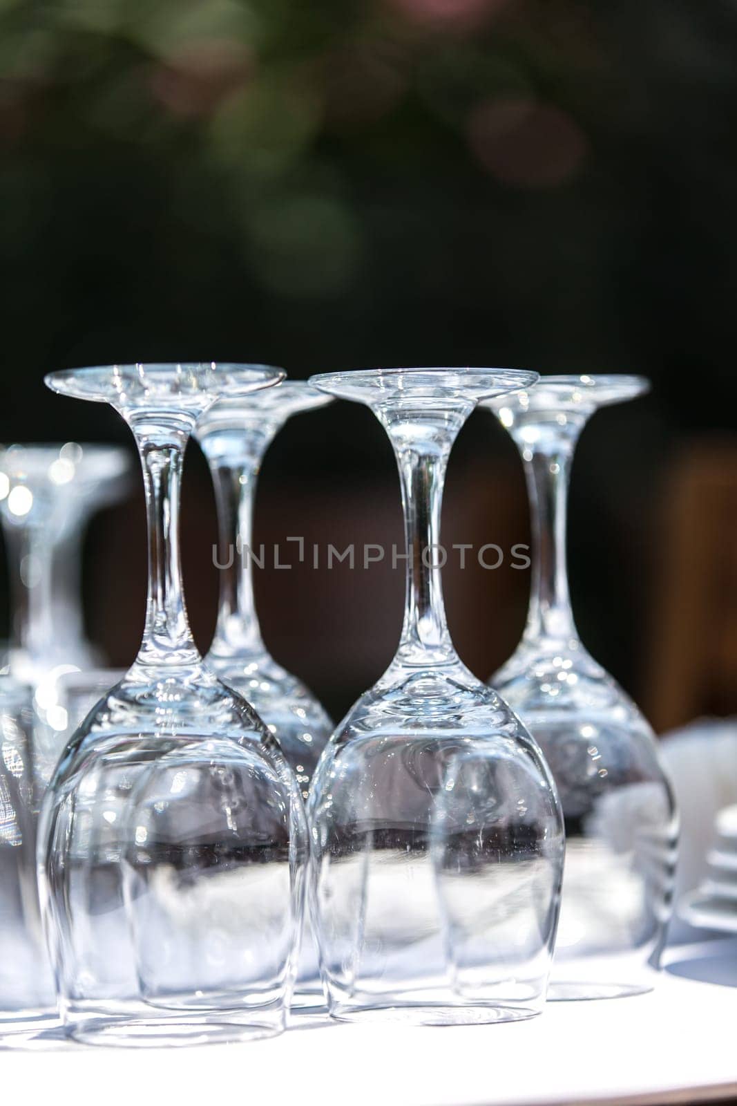 Glasses and plates on table in restaurant
