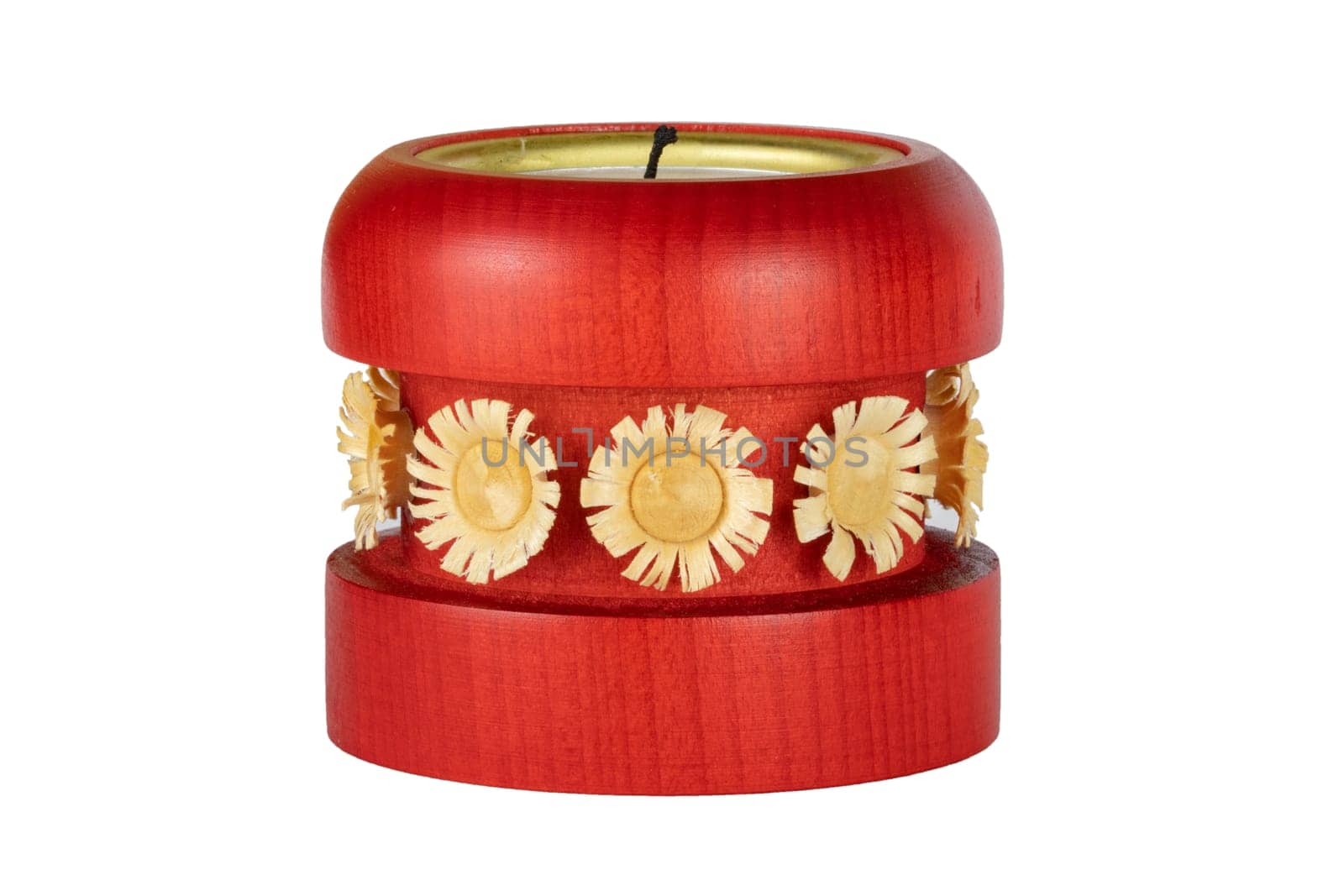 Christmas decoration background. Beautiful handmade wooden red candle holder for tealight isolated on a white background. Macro.