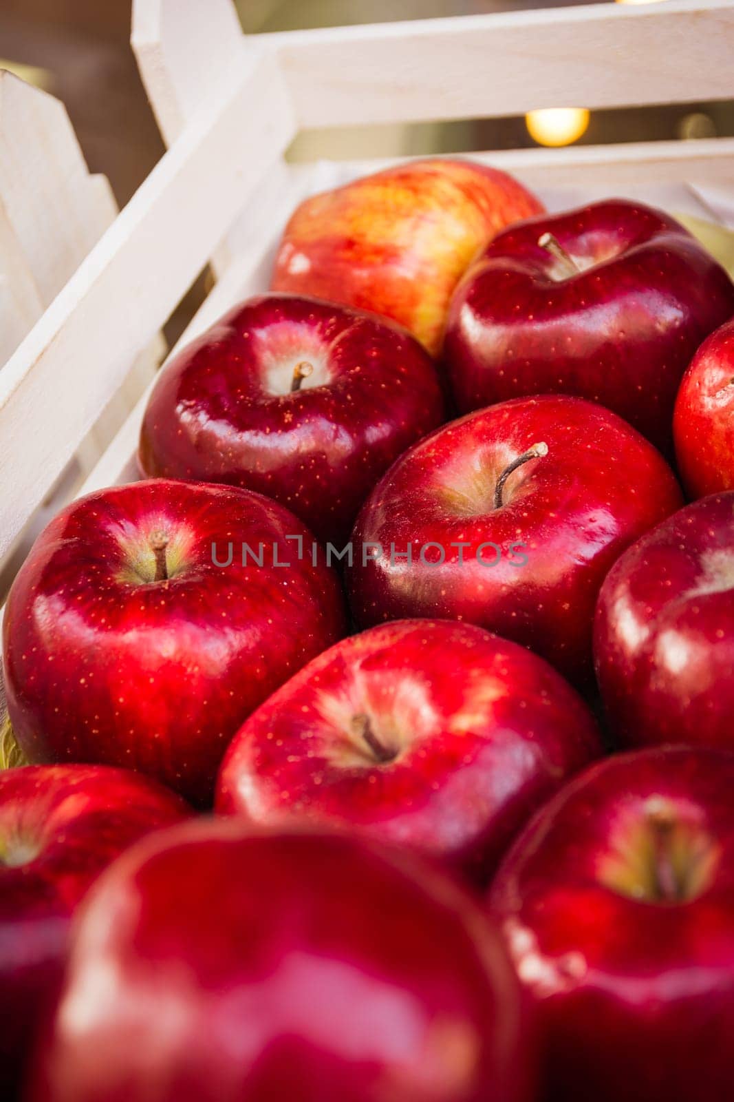 Basket Wooden Crate of Fresh Red Apples Stem Sale Focus Shallow Depth of Field