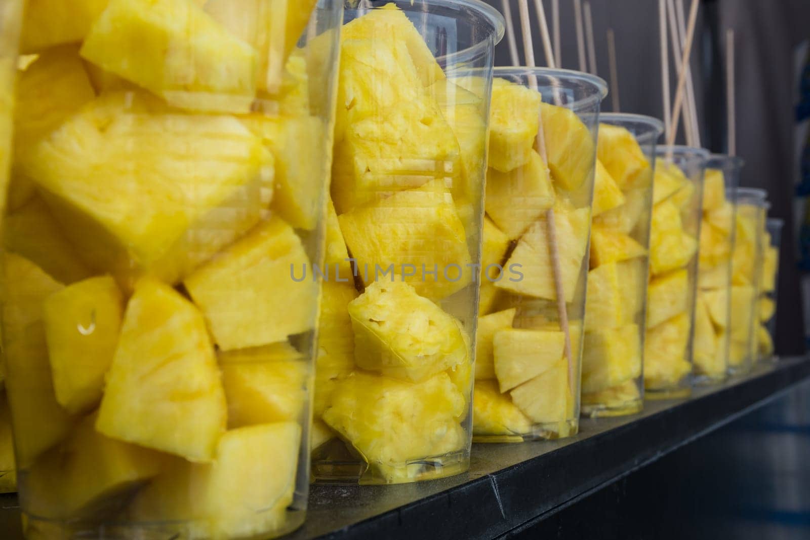 Abstract Bright Yellow Pineapple Fruit in Cups