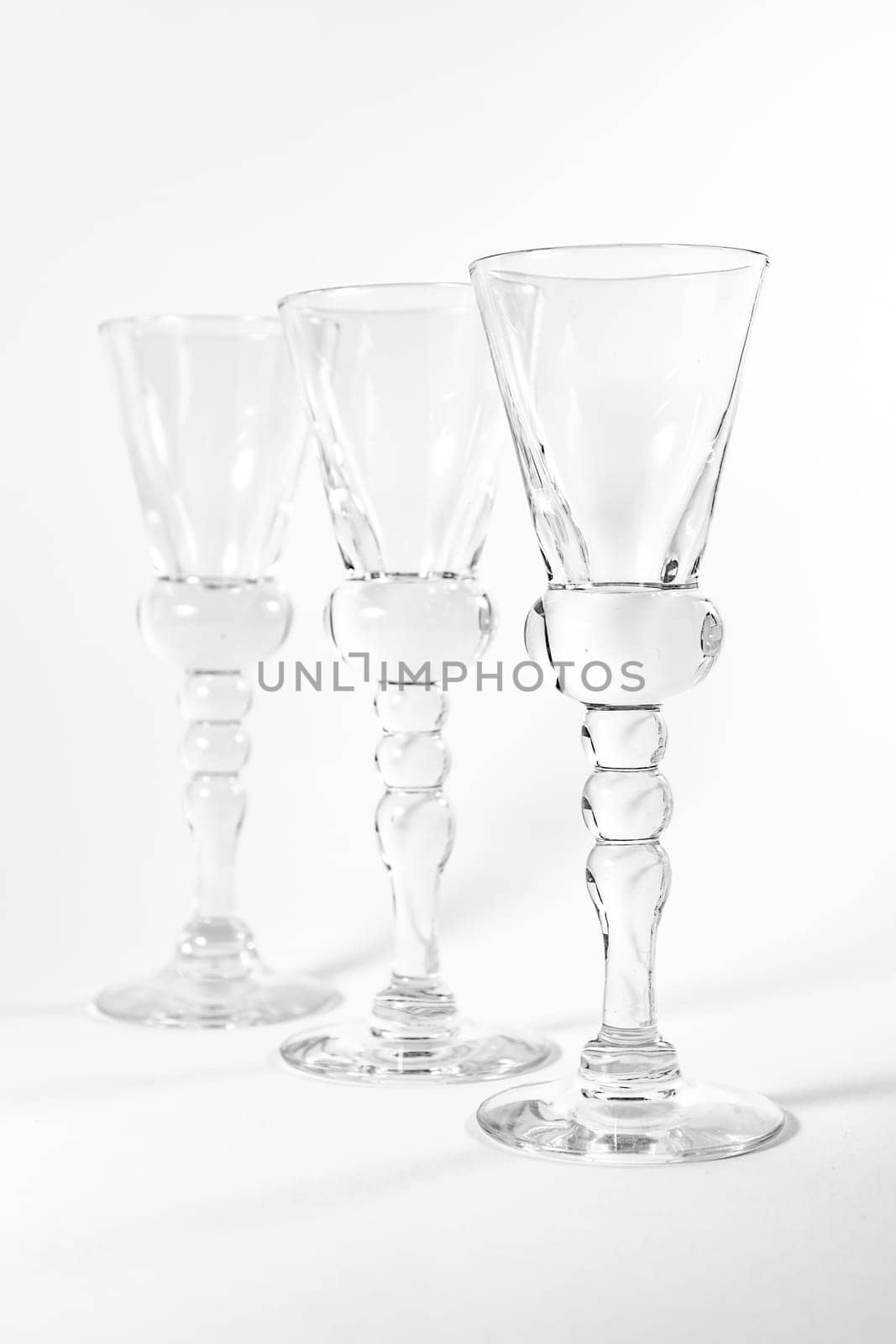 Single Shot Glass Wine Style Isolated White Background Triple Three Together Full Empty Contrast Elegant Fancy Round Stem