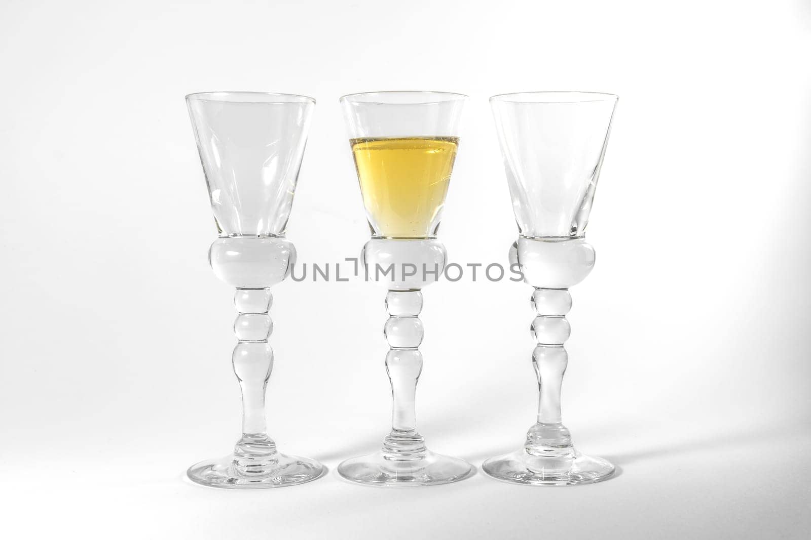 Single Shot Glass Wine Style Isolated White Background Triple Three Together Full Empty Contrast Elegant Fancy Round Stem