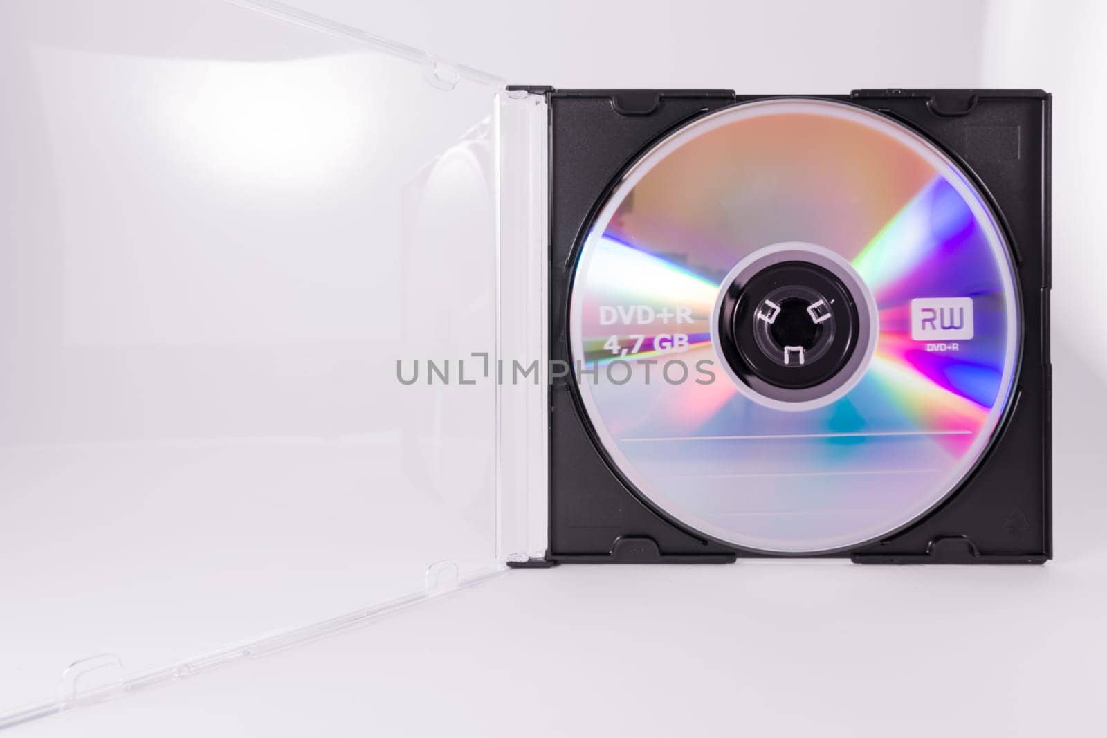 Blank DVD CD Rewriteable Circle Closeup Case Transparent Plastic White Background Object Media Office Supply