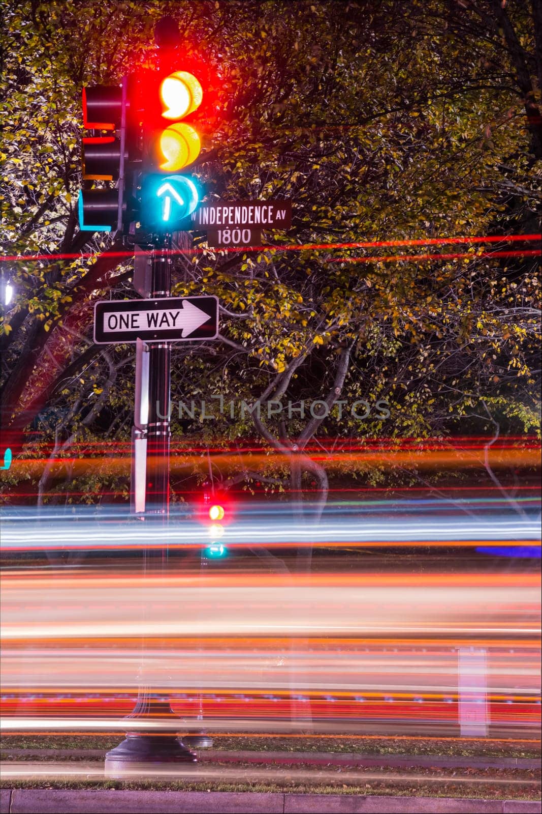 Rushing Car Light Streaks Traffic on Independence Avenue Washington DC USA