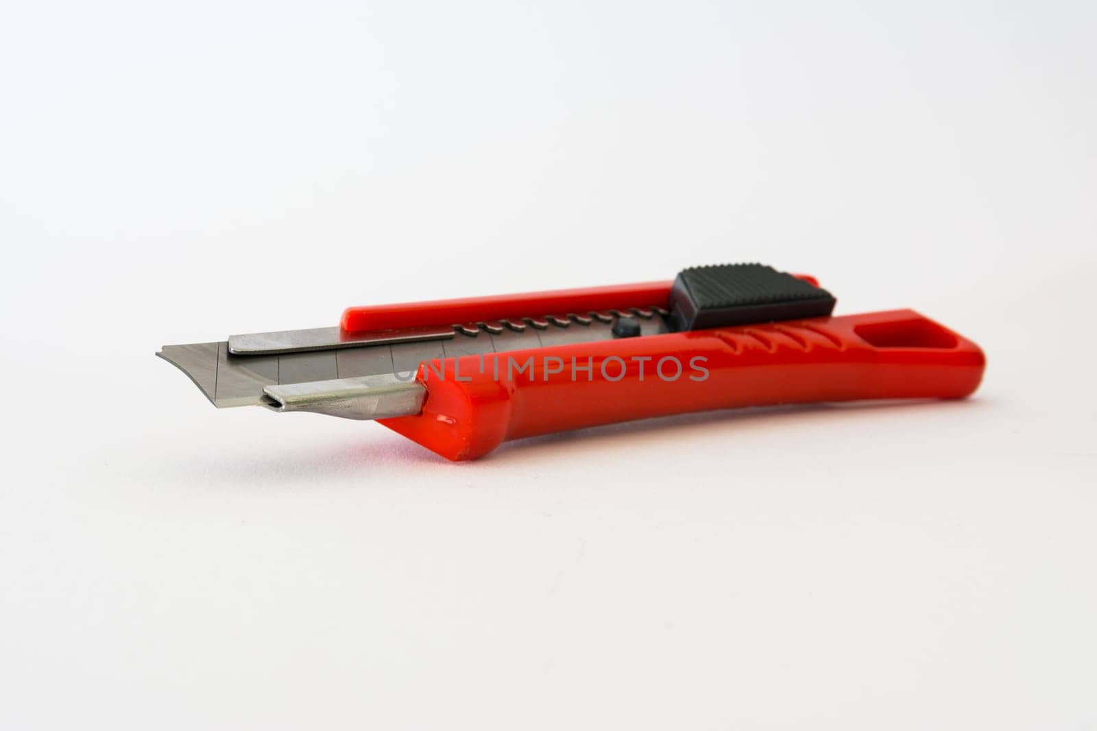 Bright Red Box Cutter Metal Blades New Clean Object White Background