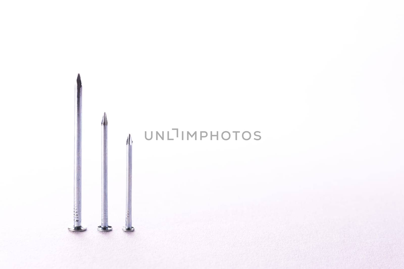 Chrome Metal Nails Decreasing Bar Graph Construction White Background