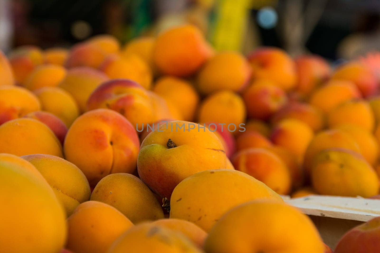 Close Up Bunch of Colorful Peaches Local Food Market