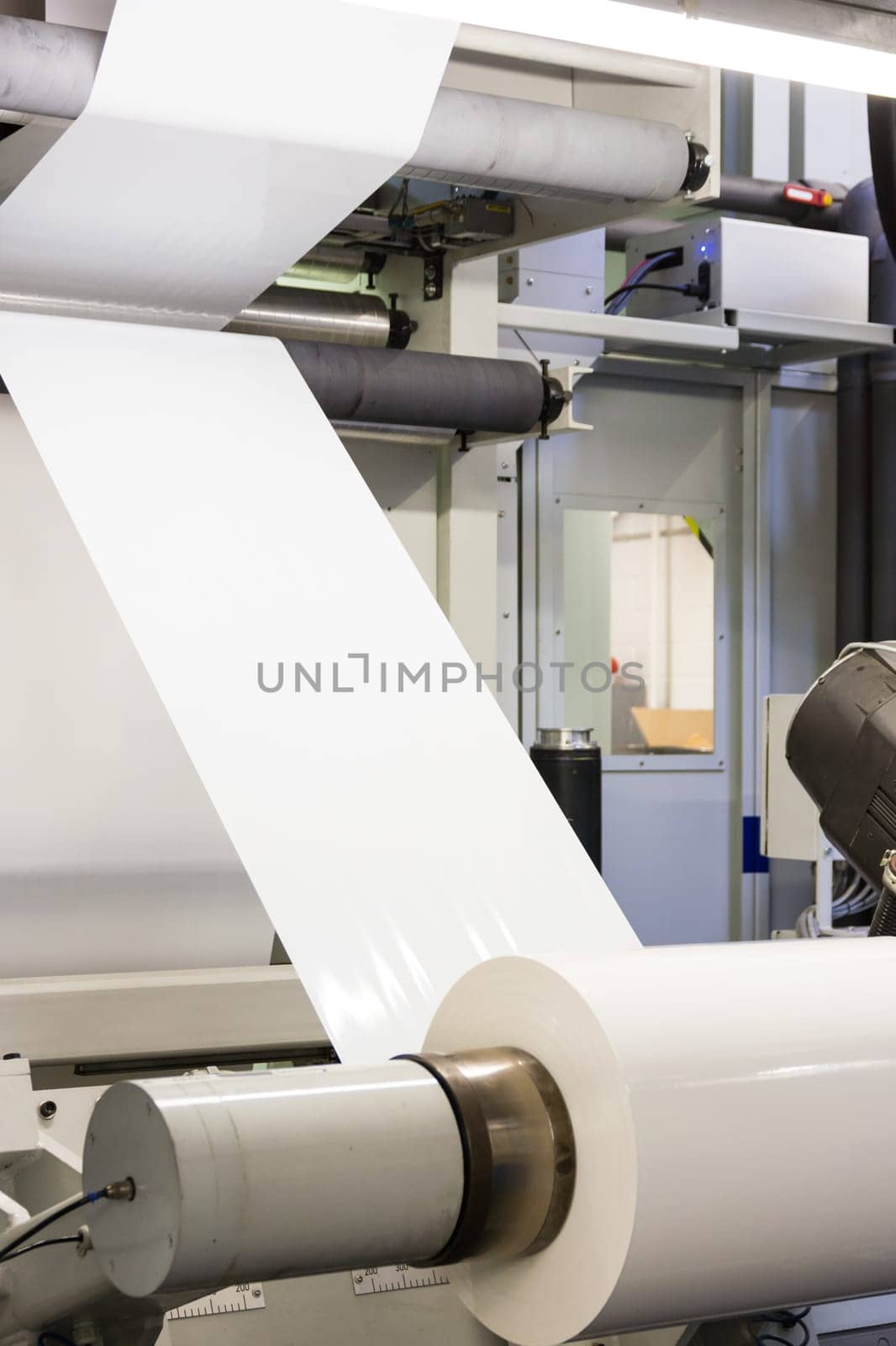 Plastic White Blank Print Feed Flexo Industry Printing Roll Processing Surface Operational Detail Closeup Factory Cylinder