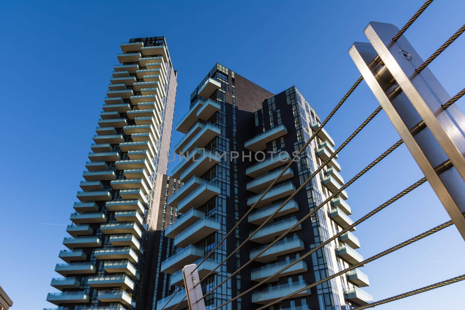 Modern Milan Italy Apartment Building Skyscrapers Bridge View Exterior Contemporary Minimal Design Outdoors Blue Skies