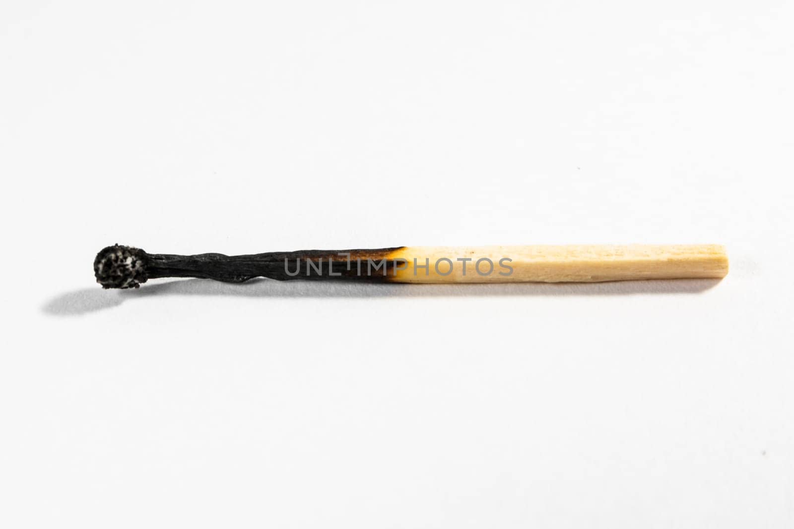 Match Stick Macro Detail Fire Symbol Safety White Isolated Background Charred Used Burned Burnt Black Wood Row Single Campfire