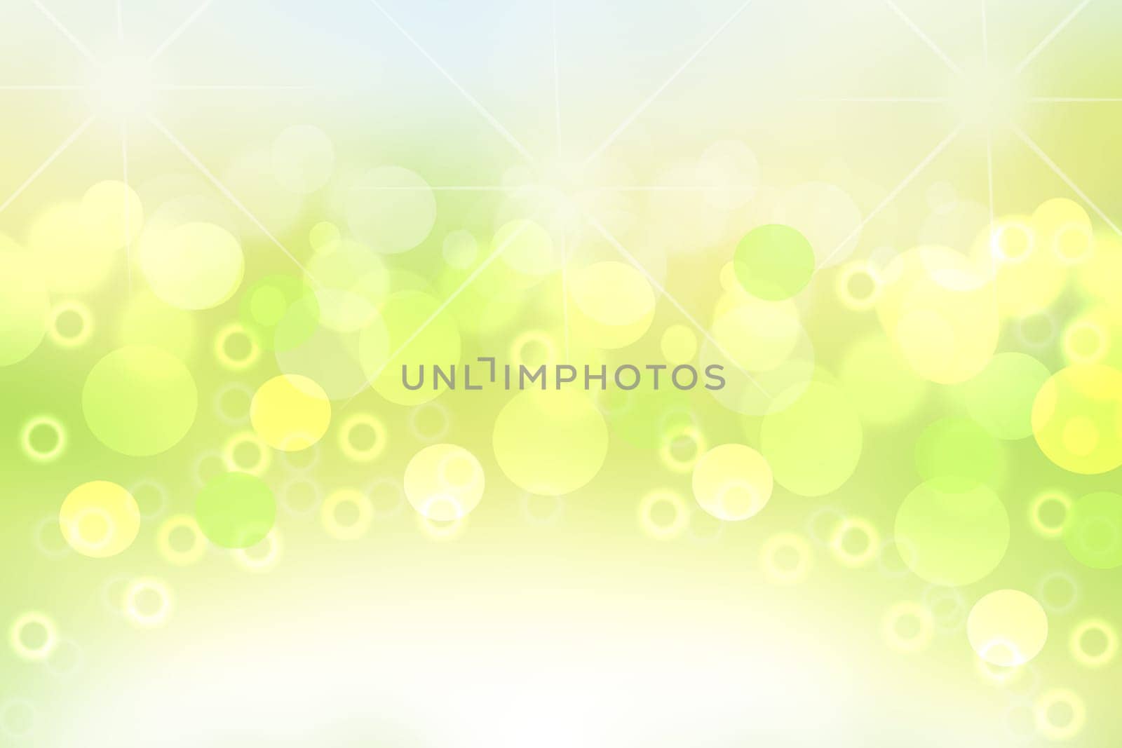 Abstract colorful gradient green yellow and white bokeh lights background texture. Space.