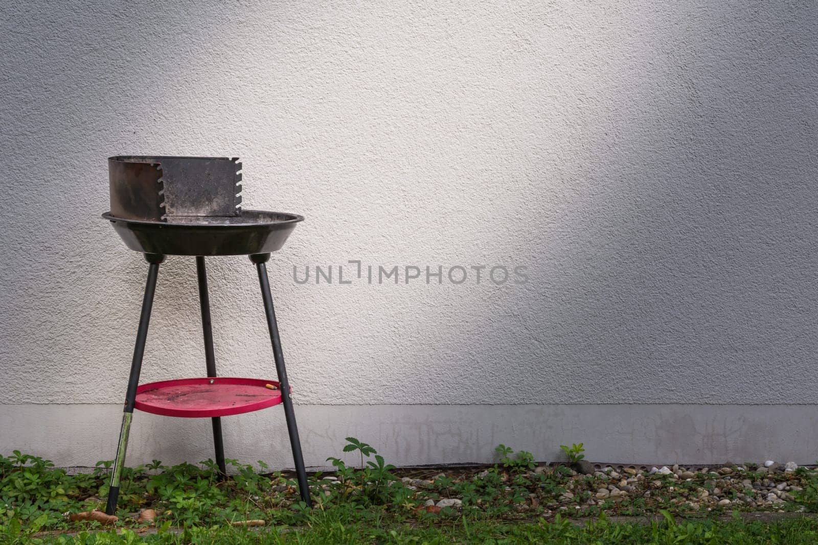 Small Charcoal Grill Spotlight Grey Architecture Exterior Wall Concrete Background Object BBQ Cooking Industry