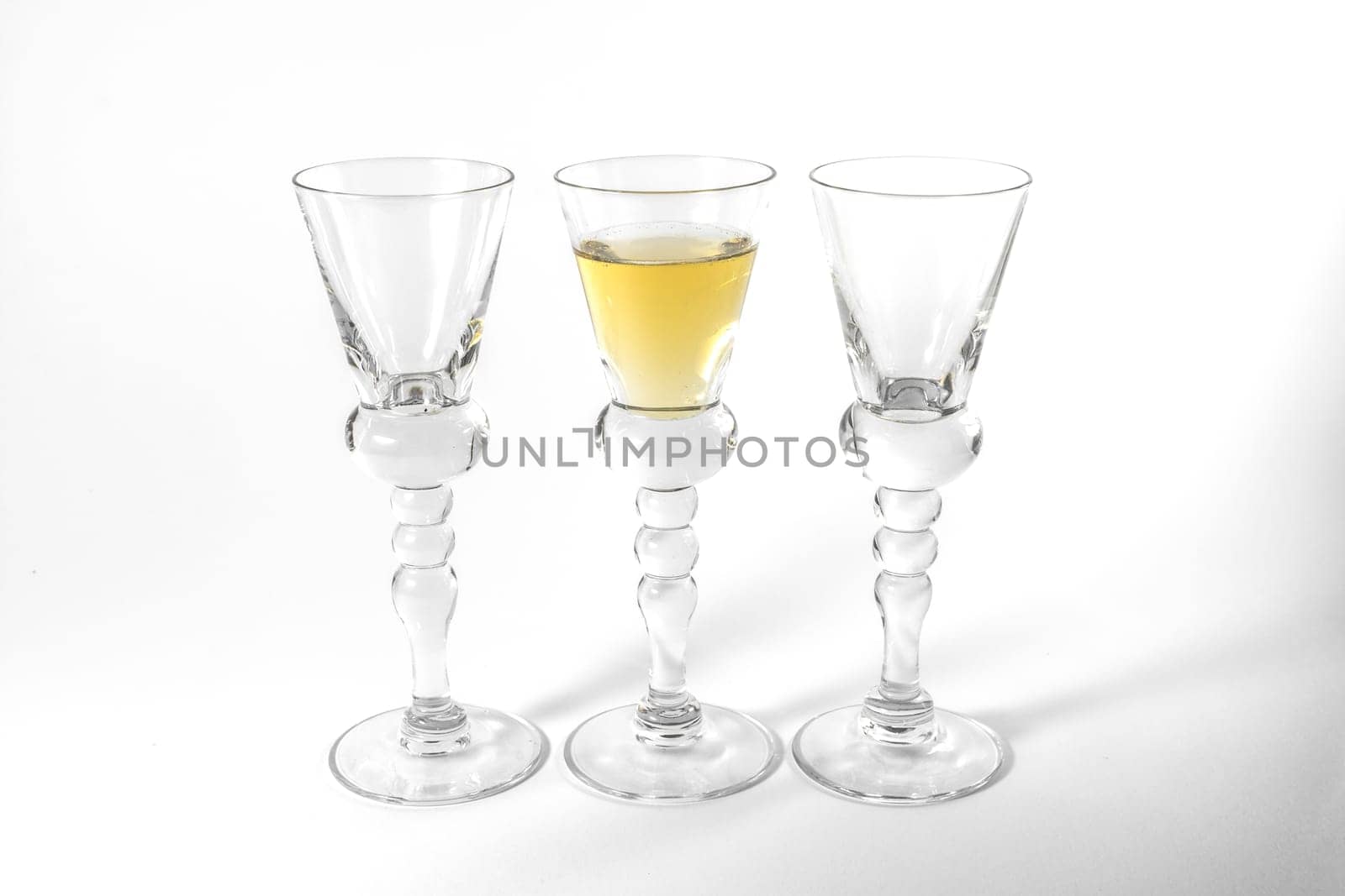 Single Shot Glass Wine Style Isolated White Background Triple Three Together Full Empty Contrast Elegant Fancy Round Stem