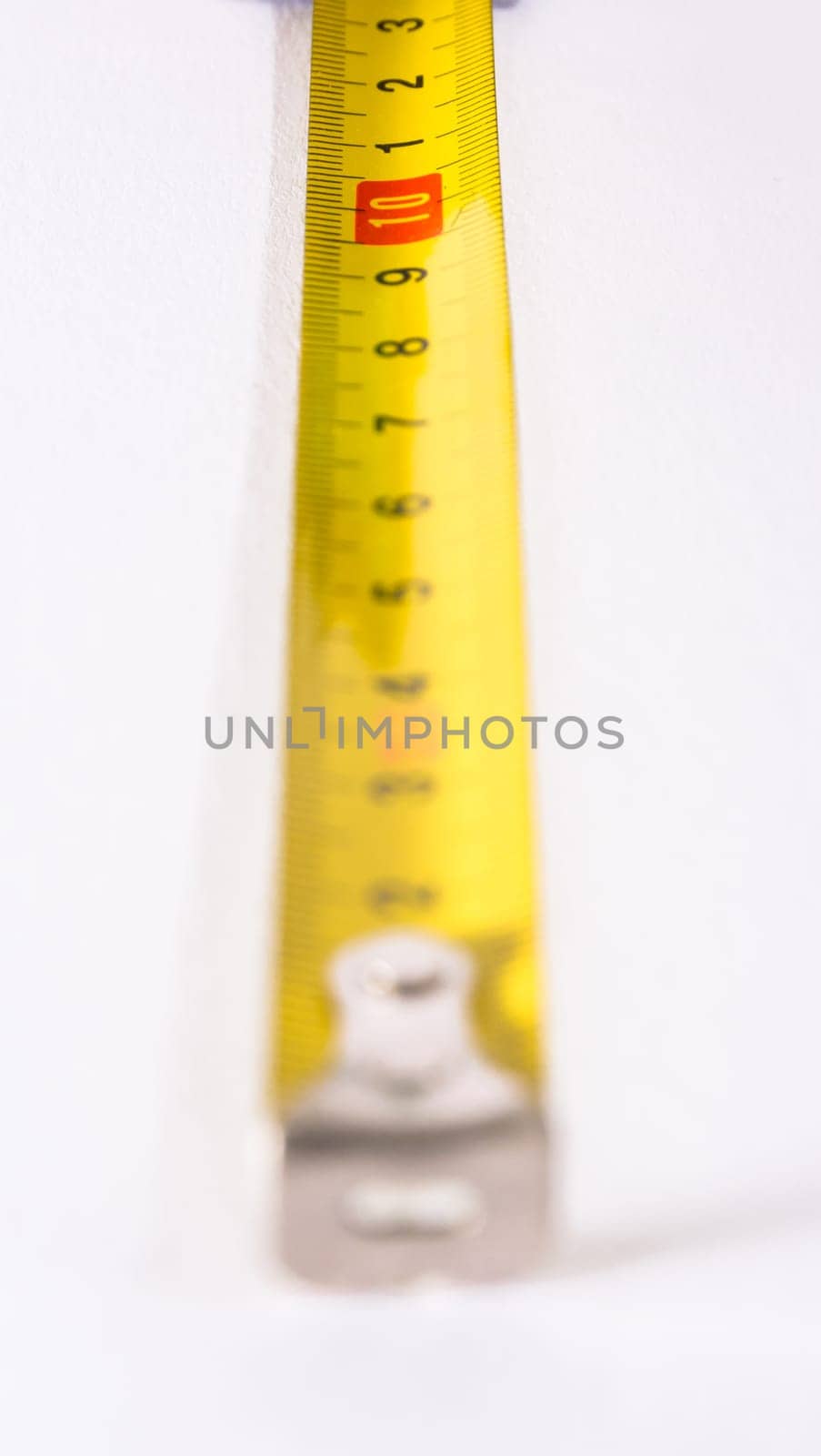 Tape Measure Rolled Out Yellow Bright Lines Closeup Construction