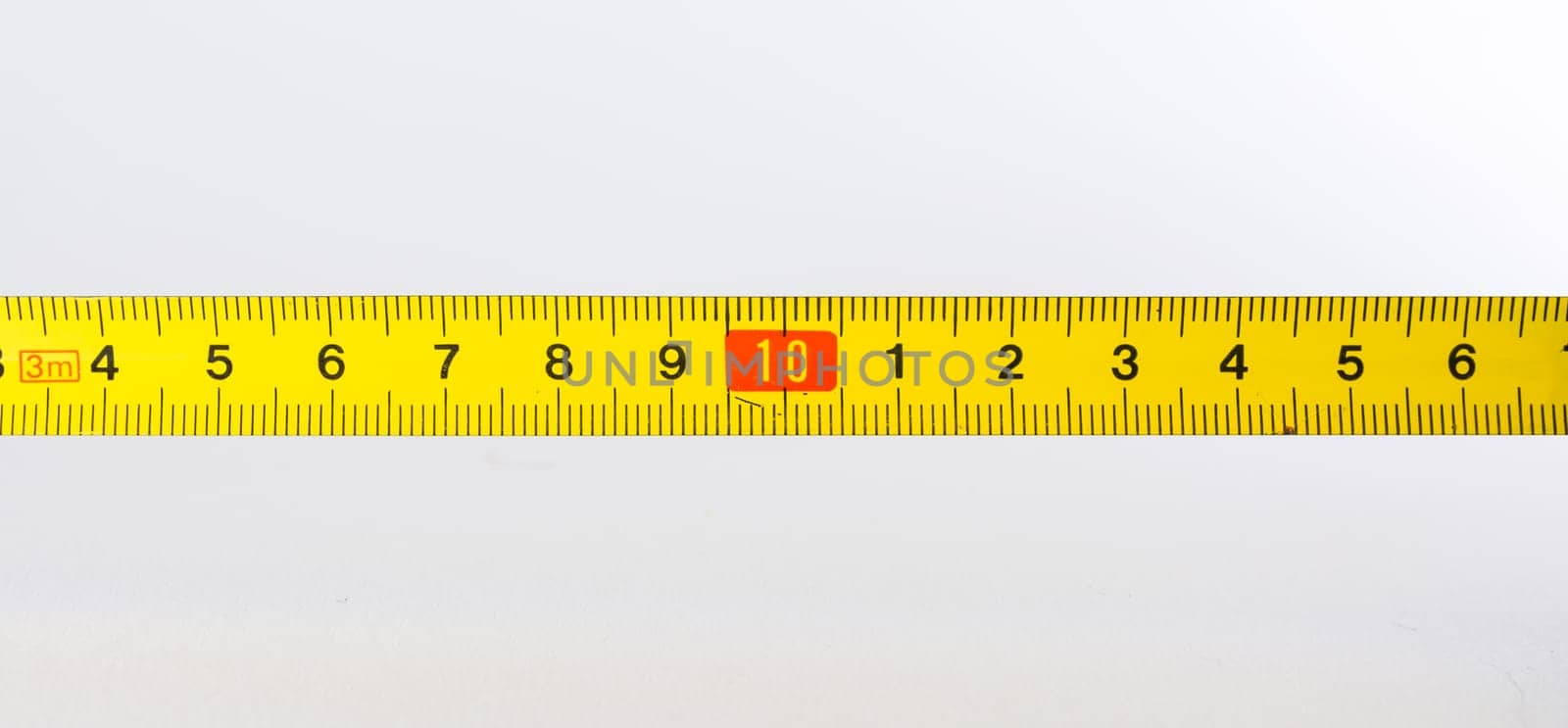 Tape Measure Rolled Out Yellow Bright Lines Closeup Construction