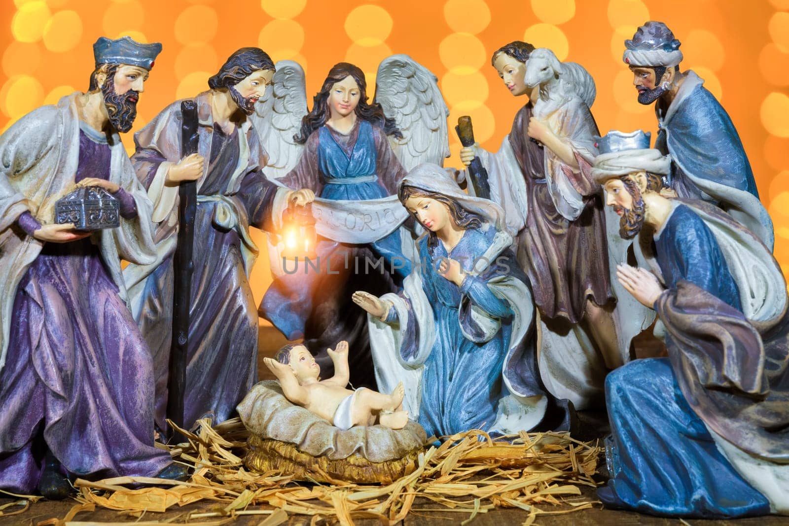 Christmas Manger scene with figurines including Jesus, Mary, Joseph and sheep. Focus on mother!