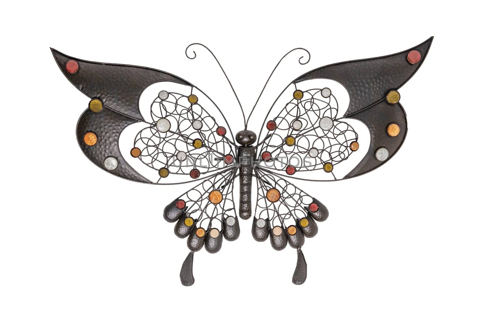 Interior decorations. Butterfly made from brown metal isolated on a white background. Butterfly decoration background.